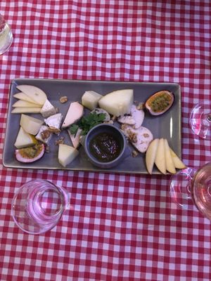 Cheese platter w a variety of delicious homemade cheeses  at La Petite Véganerie - Brasserie in Berlin