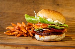 Mind Body & Soul Burger
Veggie burger with sweet chilli sauce, beetroot, semi-dried tomatoes, grated carrot, avocado, tasty cheddar, lettuce, tomato, satay sauce or soul mayo. at Burger Got Soul in Launceston