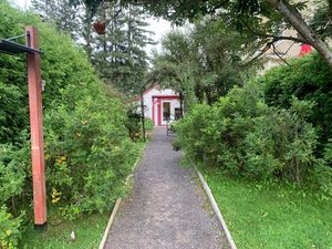 Street view and entrance from rue de L’Église, 2485 rue de l’Eglise, Val-David at Le Tapis Volant in Val-david