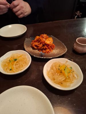 Welcome noodles and kimchi at Izakaya Sanzoku in Tokyo