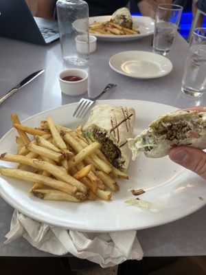 Falafel wrap with fries  at SFO - Mission Bar & Grill - T3 in San Francisco