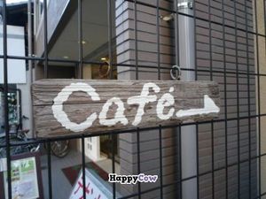 Street sign for restaurant at Kyoto Cafe Shijo Nishinotoin in Kyoto