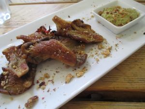 Seared Bath oyster mushrooms with pink peppercorns, topped with ground walnuts and served with sauce courchamps at The Green Rocket Cafe in Bath