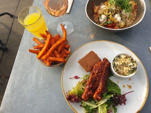 BBQ aubergine with side of fries and gnocchis   at The Green Rocket Cafe in Bath