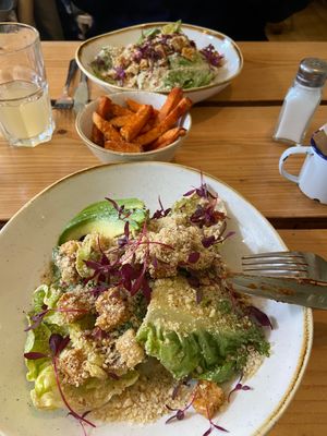 Sweet potato fries and Cesar salad with tempeh and avocado  at The Green Rocket Cafe in Bath