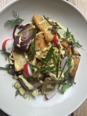 Warm potato salad, dill tofu and horseradish   at The Green Rocket Cafe in Bath