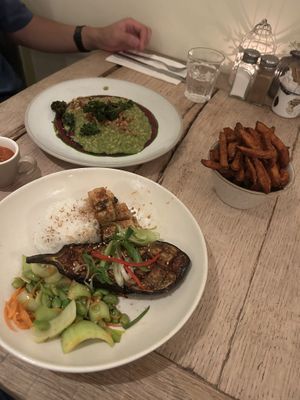 Miso artichoke, tofu and stir fried veg. Spinach risotto.   at The Green Rocket Cafe in Bath