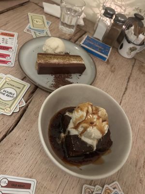 The best sticky toffee pudding i’ve ever had. And an iranian chocolate and pistachio tart.   at The Green Rocket Cafe in Bath