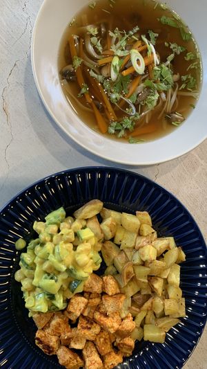 Asian mushroom soup, cashew Yoghurt chickpea salad with baked potatoes and tofu  at Babszi  in Budapest