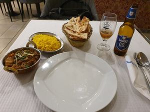 Bhindi masala (okra) with pulau rice and plain naan at Curry Leaves in Albufeira