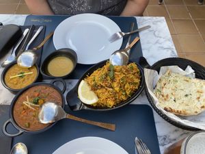 Veg jalfrezi , tarka dhal , veg biryani and garlic naan   at Indian Fusion Cala D'or in Mallorca