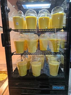 Mango lassi and vegan mango drink.  at Pure Veg India in Brussels