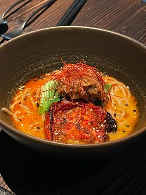 Goma Miso Ramen
in-house ramen. bok choy. mushroom. baked tomato. ginger. sesame seeds. aromatic chili-oil
 at KUKI Vegan in Kuala Lumpur