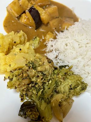 Aubergine curry, potato masala, broccoli thoran and rice   at Love Dosa in Inverness