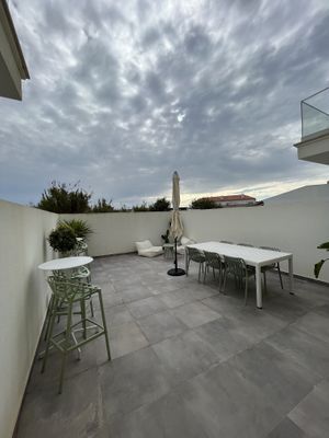 Additional backyard seating  at OakBerry in Ferrel