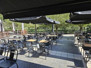 Outdoor patio overlooking the central park. at Pitaya in Andorra La Vella