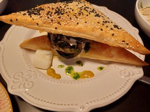 Sabich burekas. Aubergine steak, potatoes, amba and tahini sauce, in flaky borekas pastry at Malka in Tauranga
