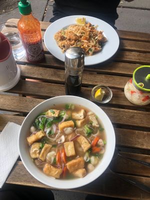 Vegan pho soup and vegan pad thai, outdoor seating  at Pho St in Budapest