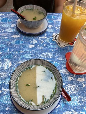 Miso soup, plus a mango drink and a lychee mint sparkling water  at OMG Asian Restaurant in Prague