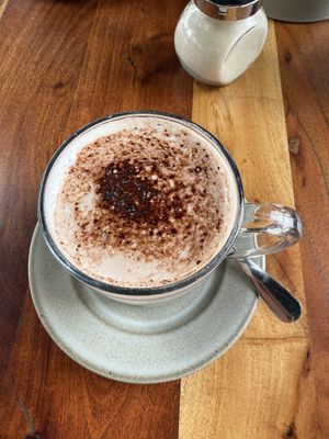 Hot drink with almond milk  at Papaya Cafe in Santa Maria