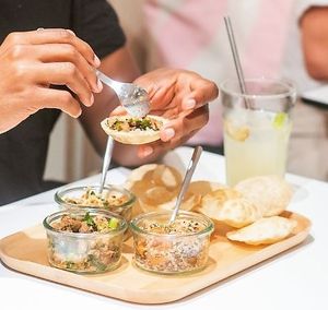 Meal Deal: 8 dops + a combination of 3 toppings + filtered water for €13,90 at Pompidop in Brussels