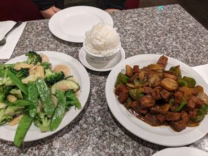 Mixed vegetables (left) and tofu-based monk's curry (right) at South North Gardens in Forks