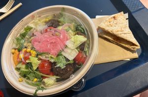 Build your own bowl ft veggies, pita, hummus, and falafel  at CAVA in Gainesville