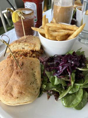 Vegan chicken aioli sandwich and a vegan ceaser. The ceaser was phenomenal, the sandwich was ok. Made good leftovers the next day as it was too big to finish!  at Evviva in Barrie
