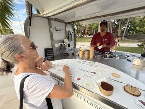 My wife ordering her ice cream   at Bount'iti in Tahiti