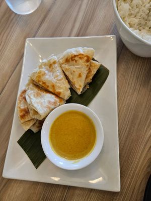 Roti Canai- Indonesian flatbread w/curry sauce at Padmanadi Vegan Eatery in Calgary