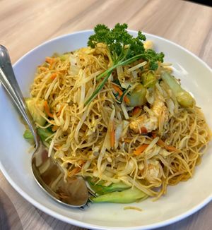Singapore Noodles -curried rice noodles with veggies and “shrimp” at Padmanadi Vegan Eatery in Calgary