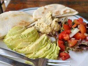 Hummus w/ avocado, tomato & pita (95 THB)  at Om Garden Cafe in Pai
