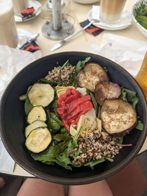 Vegan salad with courgette, aubergine, red pepper, artichoke, quinoa and sald at Praia da Luz in Porto