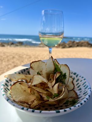 Hummus with home made chips  at Praia da Luz in Porto