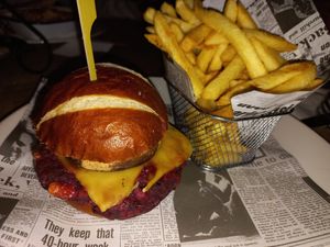 Vegan burger with vegan cheese and fries at The Rose & Crown in Orpington