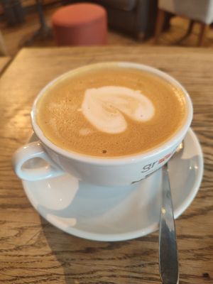 oat latte at Green Caffè Nero in Warsaw