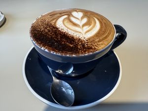 Oat milk cappuccino (soy, almond, coconut also available )  at Flo's Crêperie  in Mooloolaba