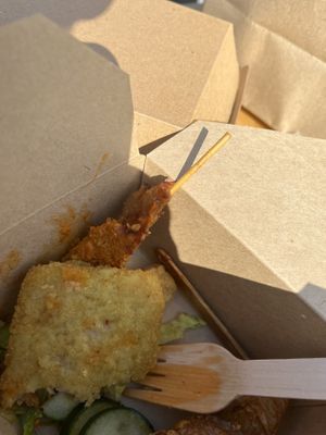 Other snacks, including satay stick  at Gillie Foods in Manchester