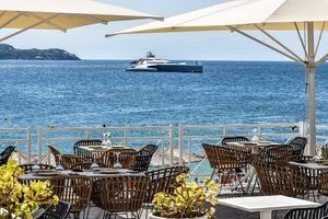 Seafront view of Achladies Beach at the octopus beach bar and restaurant  at Octopus  in Skiathos