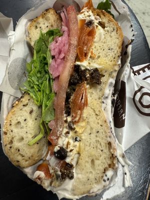 Vegan lox with arugula, tomato, onion, and capers  at Modern Bread & Bagel - Chelsea in New York City