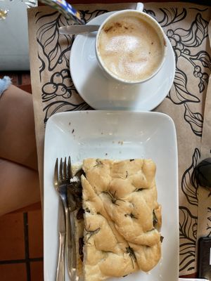 Cappuccino with plant-based milk and delicious vegan sandwich with focaccia bread.  at Grao Cafe in Rio De Janeiro
