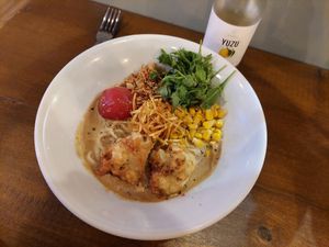 'Original' with cauliflower tempura, tomato, corn, rucola & potato (15€) + Yuzu lemonade (4.5€) at Kitchen Impossible Amsterdam in Amsterdam