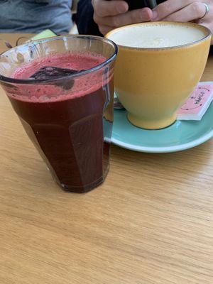 Chai latte and beetroot juice   at Amélia Foz in Porto