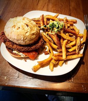 Chick'n Parm Sandwich
grilled brioche/ chick'n parmesan/ marinara/ mozzarella/ pepperoncini/ roasted sweet pepper/ pesto at Greens Organic Cafe and Market in Sarnia