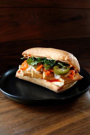 Tofu Bahn Mi: Marinated tofu, pickled vegetables and jalapeños, topped with cilantro and kewpie mayo. Ask for vegan mayo!  at Sparrow Coffee in Naperville