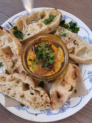 Hermelin - cashew cheese in oil with fresh bread at Szabad Bisztró - Új Hely in Budapest