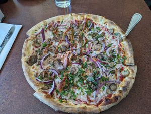Pizza with mushrooms, red onions, and Daiya cheese at Amici's East Coast Pizzeria in Mountain View