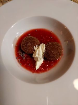 Coconut balls with strawberry sauce at Pan GhEA in Milan