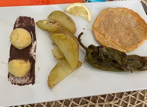 Potato, pepper, fried chickpea "schnitzel”  at Pan GhEA in Milan