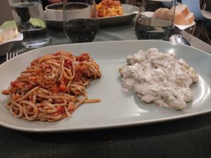 Spaghetti with vegan ragout and vegan gnocchi cacio & pepe at Pan GhEA in Milan